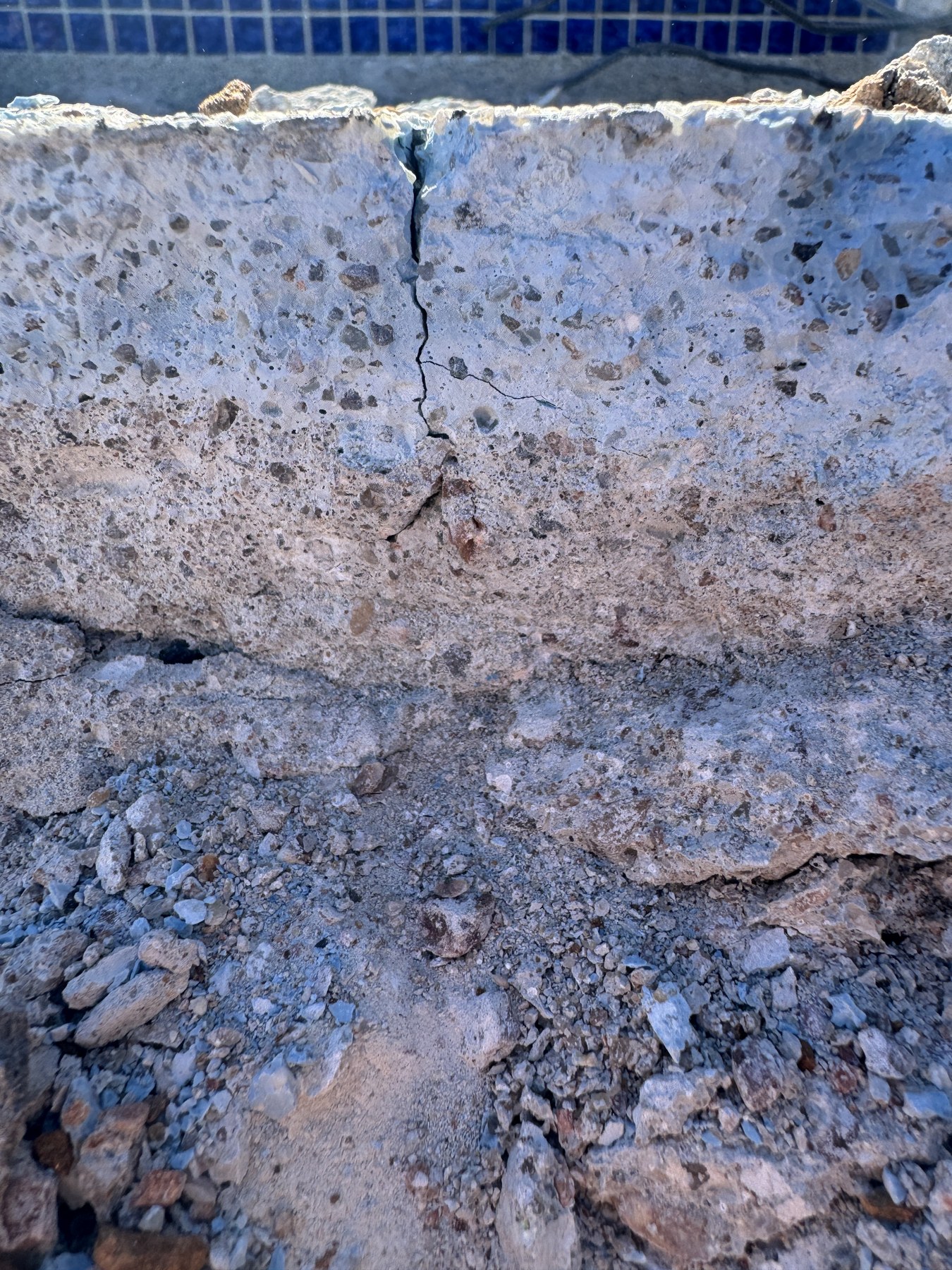 Exposed pool shell crack profile during ASR damage documentation