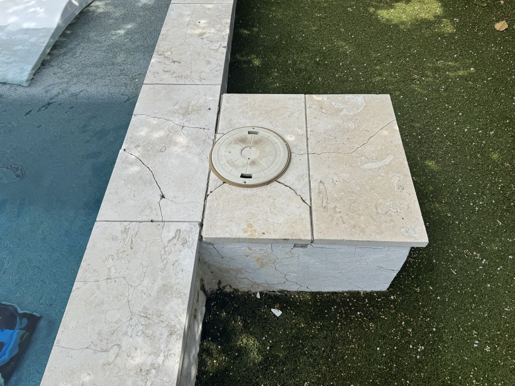 Cracking around residential pool skimmer before ASR pool rebuild