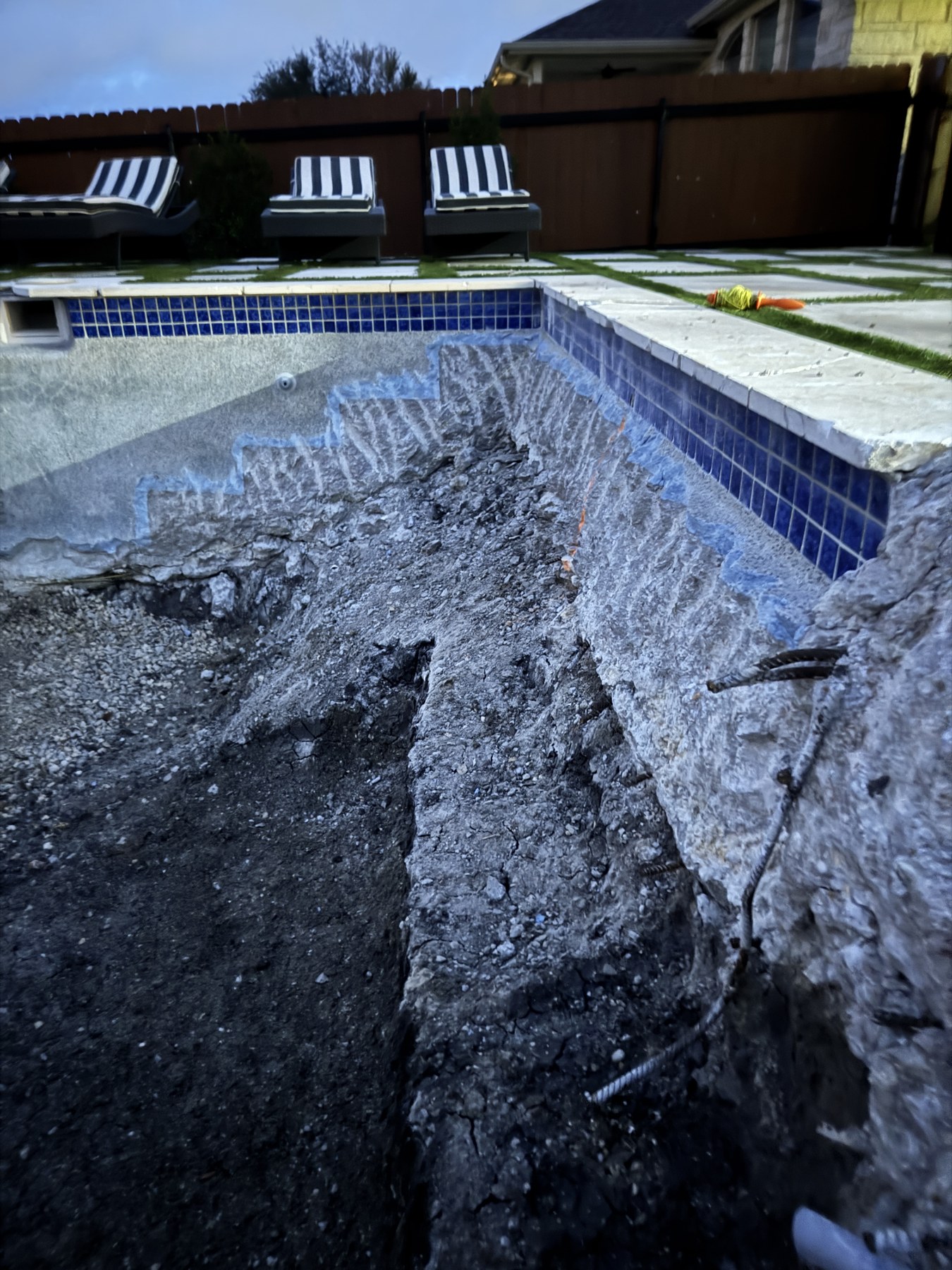 Partial pool demolition with two walls preserved during ASR rebuild